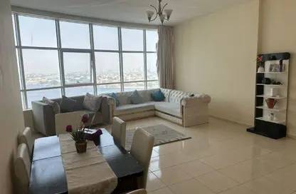 شقة - غرفة نوم - 2 حمامات للايجار في أورينت تاور 1 - أورينت تاور - البستان - عجمان