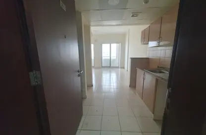 Apartment - Studio - 1 Bathroom for rent in X23 - England Cluster - International City - Dubai