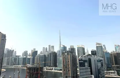 شقة - غرفة نوم - 2 حمامات للايجار في زا باراجون لآي جي او - الخليج التجاري - دبي