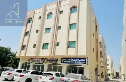 عمارة بالكامل - 8 غرف نوم - 8 حمامات للبيع في مجمع مويلح - تجارية مويلح - الشارقة