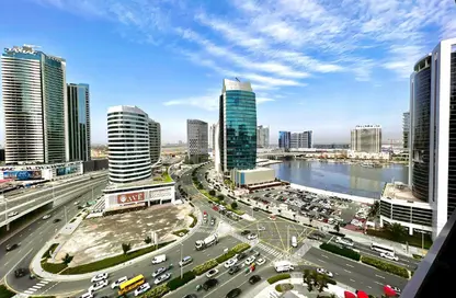 شقة - غرفة نوم - 2 حمامات للايجار في ماغ 318 - الخليج التجاري - دبي
