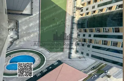 شقة - غرفة نوم - 2 حمامات للايجار في أورينت تاور 1 - أورينت تاور - البستان - عجمان